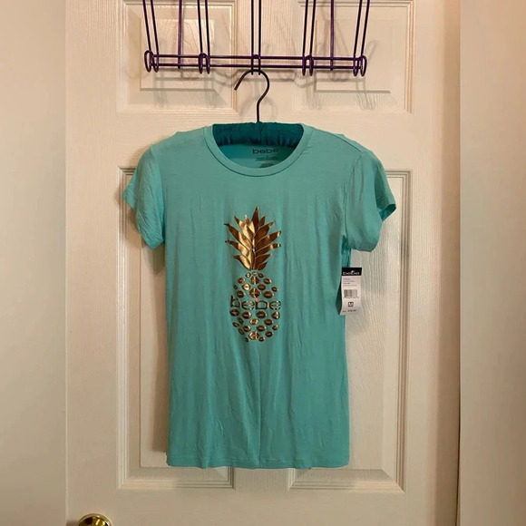 bebe Tops - Bebe pineapple tee shirt NWT